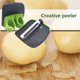 thumbnail image 3 of Wdftyju Pelador de frutas y verduras creativo, tipo de dedo, trituradora de patatas y zanahorias, rallador Wdftyju 3ah6ke2be9py6at1, 3 of 9