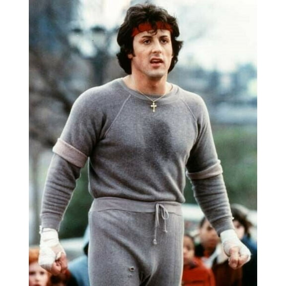 Sylvester Stallone as Rocky in sweat-shirt and pants in boxing ring poster