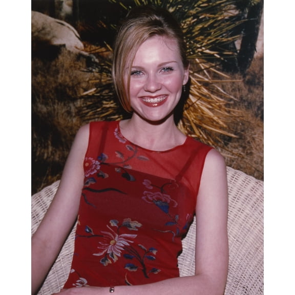 Kirsten Dunst smiling in Red Dress Photo Print (8 x 10)