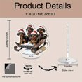 thumbnail image 2 of Rotating acrylic display features three dachshunds in Santa hats on a sled with vivid colors and intricate details against a white background, 2 of 6
