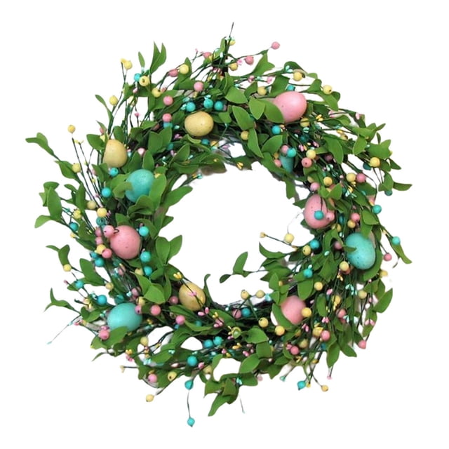 Corona redonda de Pascua con huevos en tonos pastel para colgar en la puerta principal o en la pared. Decoración con follaje verde. estilo yo