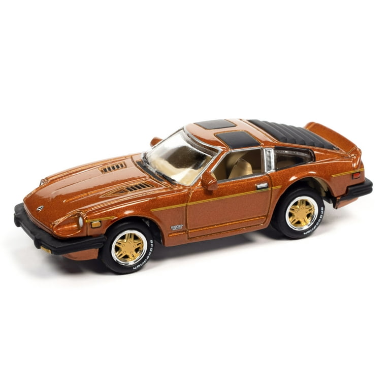 1982 Mazda RX-7 Blue Met. & 1981 Datsun 280ZX Orange Mist