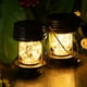 thumbnail image 1 of Paquete de 2 linternas solares para exteriores, impermeables, decorativas, luces colgantes, linterna solar, lámpara de mesa, luz de paisaje, patio, jardín, patio, blanco cálido, con luces LED de hadas, 1 of 5