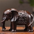 thumbnail image 1 of Ebony solid wood carved elephant figurines, a pair of auspicious ornaments for home living rooms, used to fill in missing corners and decorate., 1 of 4