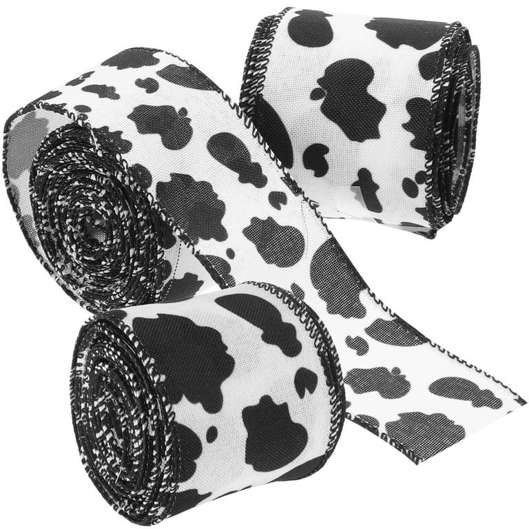 Cow pattern ribbon printed in black and white on 1.5 white single