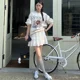 thumbnail image 4 of Falda de pastel blanca francesa de estilo nuevo de verano 2024 para mujer, falda abullonada de cintura alta y adelgazante de corte A en la cadera, 4 of 4