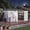 White, variant on Garvee 10 x 8 FT Outdoor Storage Shed with Pushable Window, LED Light & Pegboard, Metal Garden Shed with Sloped Roof, Air Vent & Lockable Doors, White