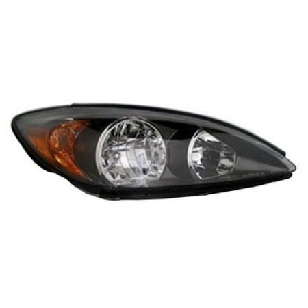 2003 toyota camry headlight bulb replacement