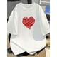 thumbnail image 1 of Camiseta clásica de algodón negra con diseño de corazón: camiseta informal, transpirable y versátil de manga corta y cuello redondo para un look informal., 1 of 6