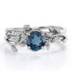 thumbnail image 1 of JeenMata Anillo de Bodas Solitario con Topacio Azul Londres de Talla Redonda de 0,5 TCW y Hoja y Enredadera Chapado en Oro Blanco de 18 K sobre Plata, 1 of 6