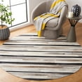 thumbnail image 2 of SAFAVIEH Studio Leather Forrester Striped Area Rug, Ivory/Black, 6' x 6' Round, 2 of 11