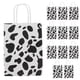 thumbnail image 1 of 12 bolsas de papel con estampado de vaca: Bolsas de regalo con asas para fiestas de cumpleaños, baby showers y celebraciones con temática campestre. Ideales para envolver dulces., 1 of 7