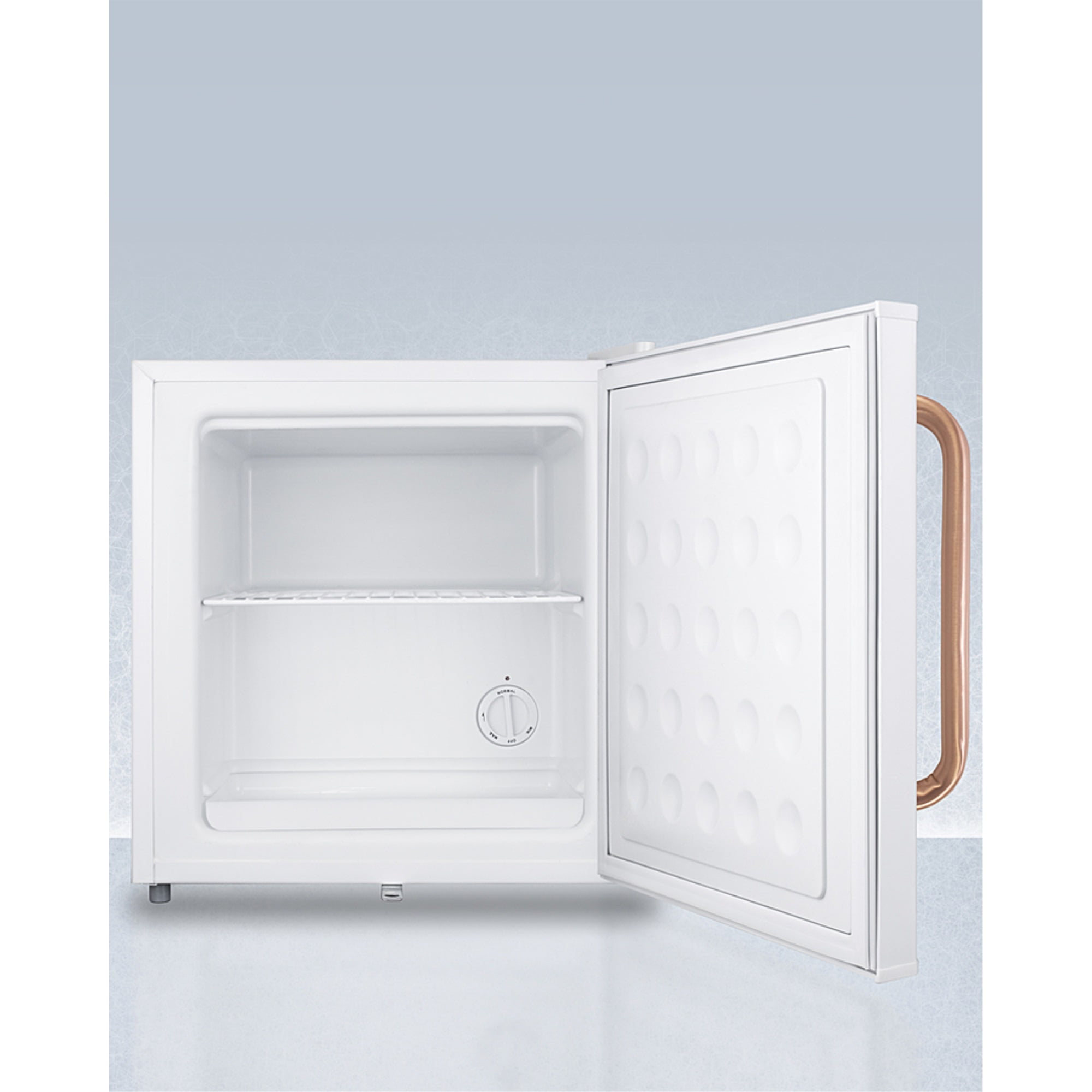 Compact manual defrost all-freezer with lock and copper handle