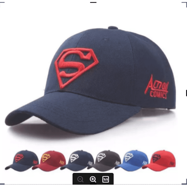 FUZZLE CITY RANDOM unisex Superman logo baseball cap in navy blue with a red embroidered Superman 'S' logo on the front and 'Action Comics' text on the side. The cap features a curved brim and adjustable strap for a comfortable fit. Additional colors include red, black, grey, and blue, shown below the main image.
