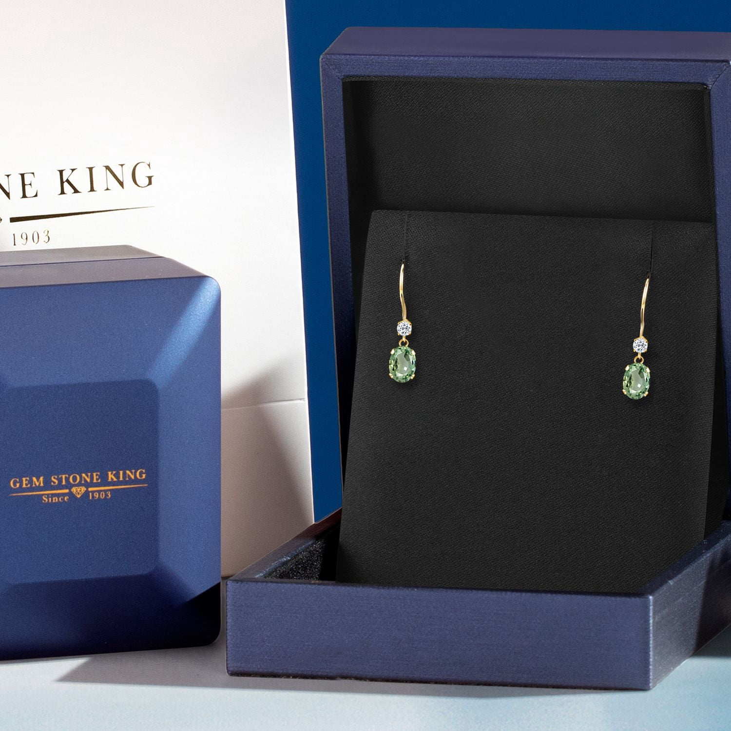 Gem Stone King 14K Yellow Gold Green Sapphire and White Topaz French Wire Dangle Earrings for Women (1.26 Cttw, Gemstone September Birthstone, Oval 6X4MM and Round 2.5MM)