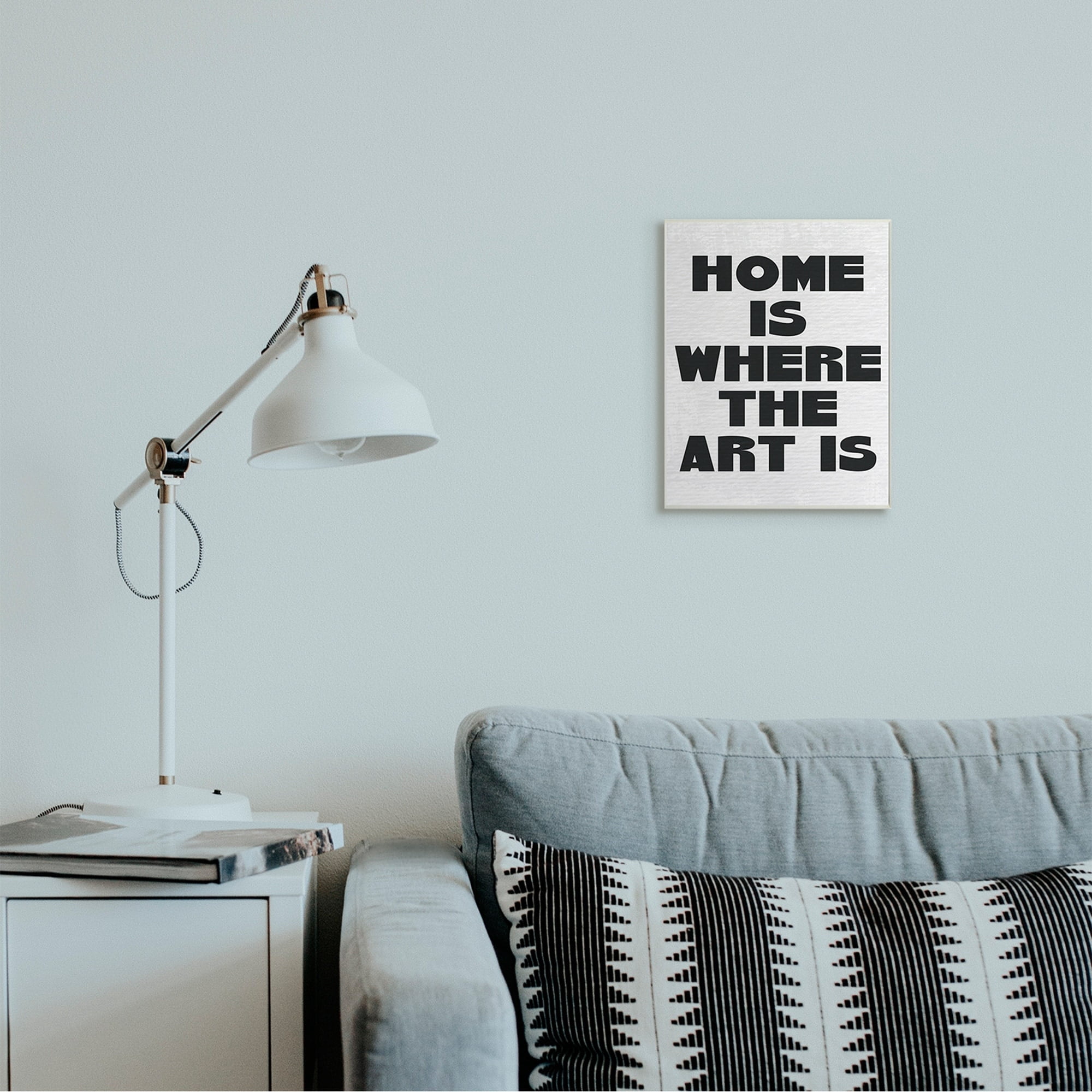 Stupell Industries Home Is Where Art Is Phrase Minimal Black White Wall Plaque by Daphne Polselli