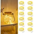 thumbnail image 1 of Paquete de 12 Guirnaldas de Luces con Pilas, 2m 20 LED Guirnaldas de Luces LED, Mini Guirnaldas de Luces LED Impermeables para Botellas, Bodas, Fiestas, Navidad, Dormitorios - Blanco Cálido, 1 of 5