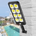 thumbnail image 1 of Luz exterior con sensor de movimiento, lámpara solar de control remoto 200 COB para jardín y patio, 1 of 7