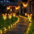 thumbnail image 1 of Luz LED de flor con energía solar para jardín exterior, decoración de girasol impermeable para camino con estaca de tierra, 1 of 6
