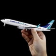 thumbnail image 2 of Maquette d'Avion Rétro Élégante American Westjet B737 en Matériau Composite, Pièce Décorative Stylée avec Roues Mobiles, 2 of 9