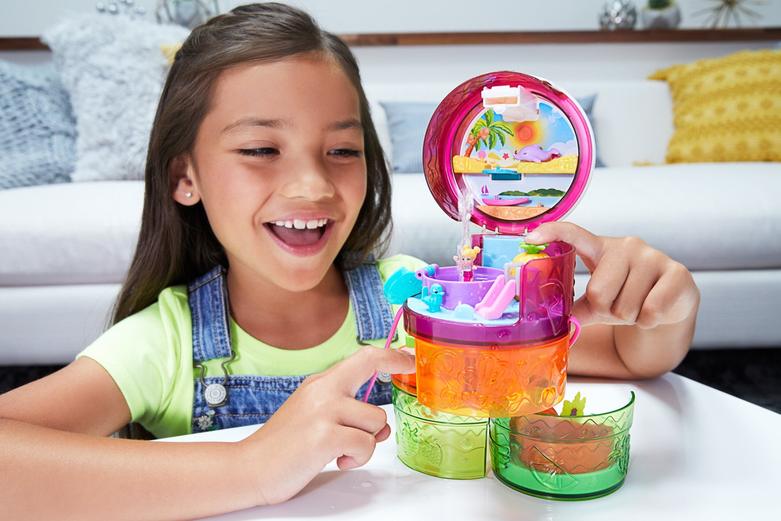 Great Gift for Ages 4 Years Old & Up Polly Pocket Spin ‘n Surprise Compact Playset 3 Floors Waterpark Theme Tropical Smoothie Shape 25 Surprise Accessories Including Polly & Shani Dolls
