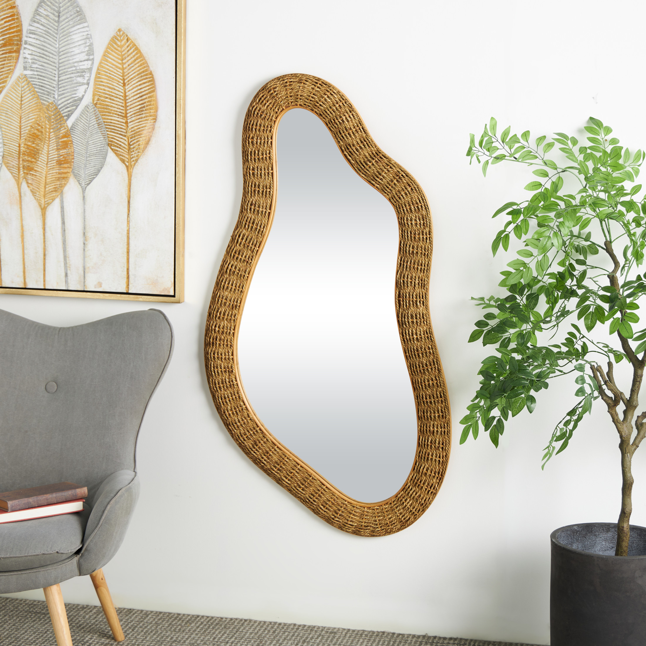 DecMode 28" x 52" Brown Handmade Woven Oval Abstract Wall Mirror