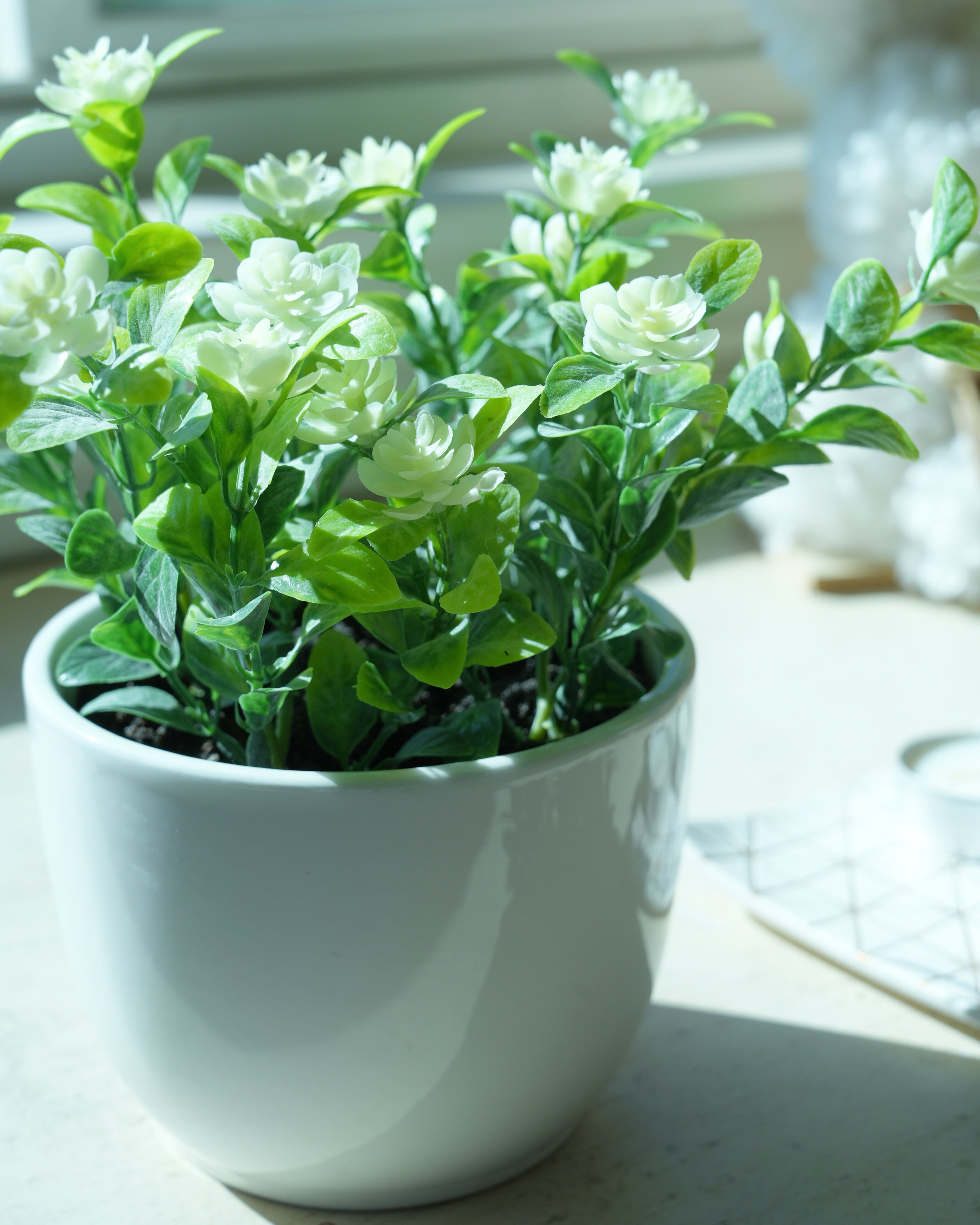 Mainstays 7.5” Artificial Eucalyptus and Flower in White Ceramic Pot Made for Tabletops – 1.1 lbs