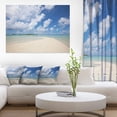 thumbnail image 1 of Serene Maldives Beach under Clouds, 1 of 3