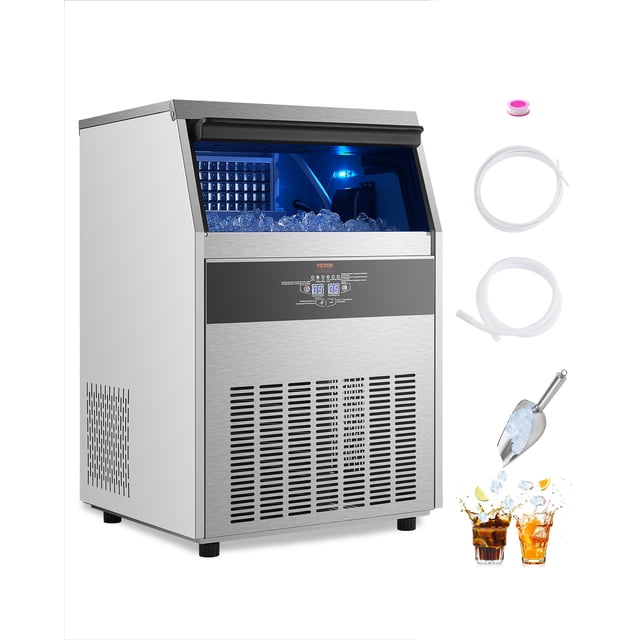 vevor máquina de hielo comercial de gabinete independiente, 160 lb/24 h, 80 cubos de hielo Máquina de hielo comercial plateada, vista 3/4 frontal con tapa superior abierta y cubitos en el depósito; panel digital LED con botones mecánicos, rejilla de ventilación inferior e interior iluminado en azul; incluye pala de acero inoxidable y mangueras; adecuada para cafetería, bar o preparación de postres, funcionamiento silencioso ≤65dB.