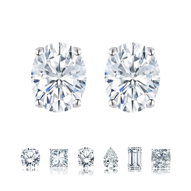 jeenmata aros tipo botón solitario de 4 puntas con moissanita ovalada de 1 quilate chapados en oro blanco de 18 k sobre plata, vista frontal centrada de aretes con moissanita blanca corte oval en engaste de 4 puntas bañados en oro blanco sobre plata, facetas y reflejos visibles sobre fondo blanco; suelen personalizarse con otros baños de metal y son ideales como regalo de aniversario.