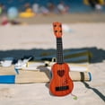 thumbnail image 2 of Miangastore Khaki Mini Guitar for Playing Crafted with Plastic Material Clear Finish 4 Strings 44cm, 2 of 8