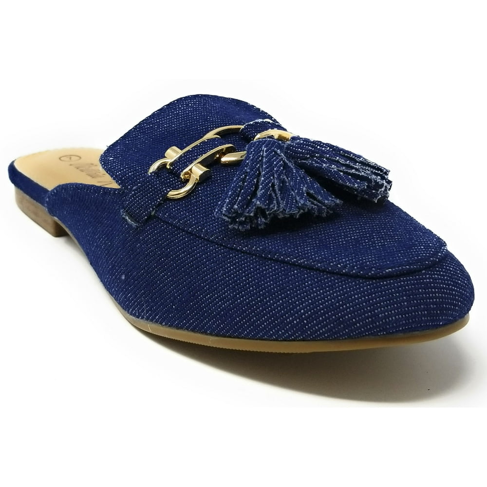 flat mules with tassels