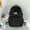 Black, variant on Mwjwdo Classic Solid Color Casual Daily Backpack, Lightweight Multi-Pocket Student School Book Bag for Outdoor Travel Blue