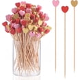 thumbnail image 1 of Pack de 100 Palillos de Bambú con Forma de Corazón en Colores Rosa Rojo y Dorado para Cócteles y Aperitivos, 1 of 5