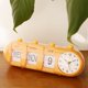 thumbnail image 1 of Reloj de de página de soporte de escritorio de reloj abatible automático digital creativo amarillo 2 Colco Reloj plegable, 1 of 8