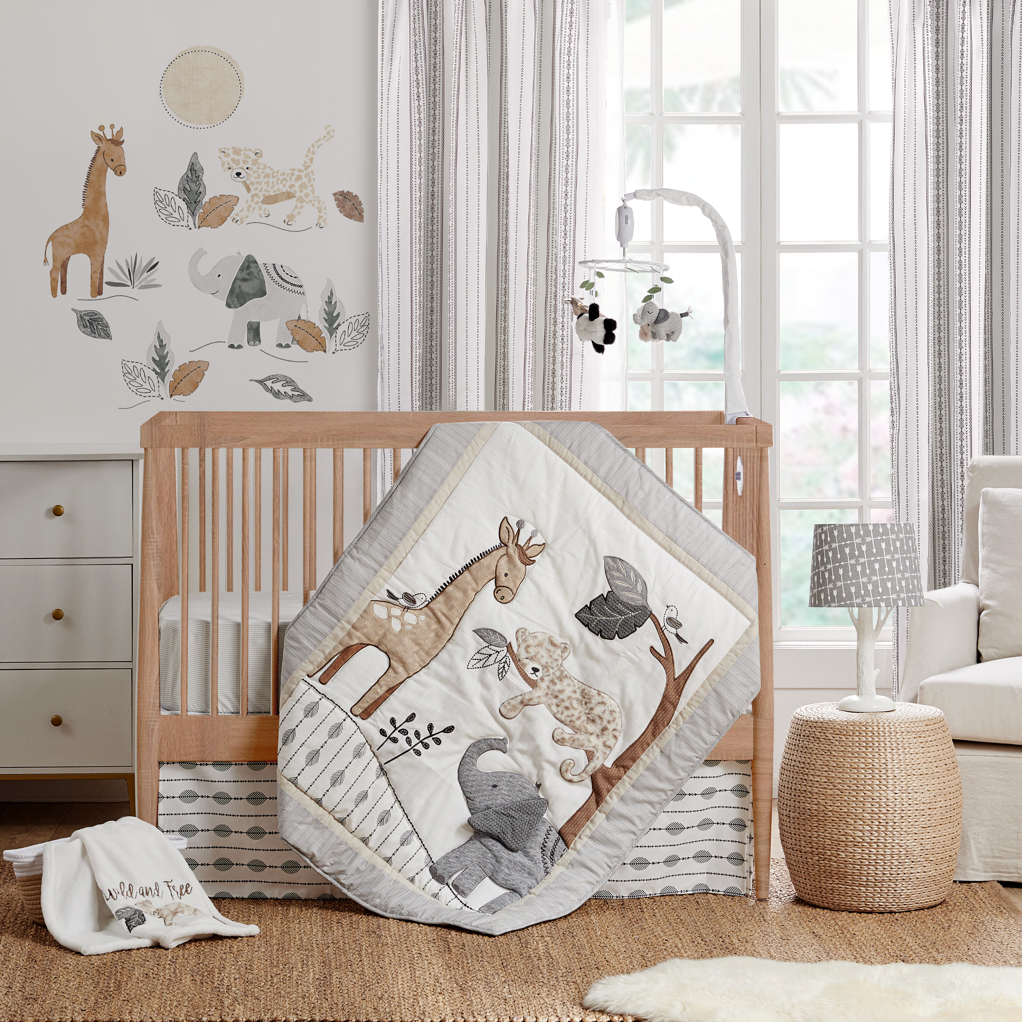 Grey funcionaban and white crib bedding set