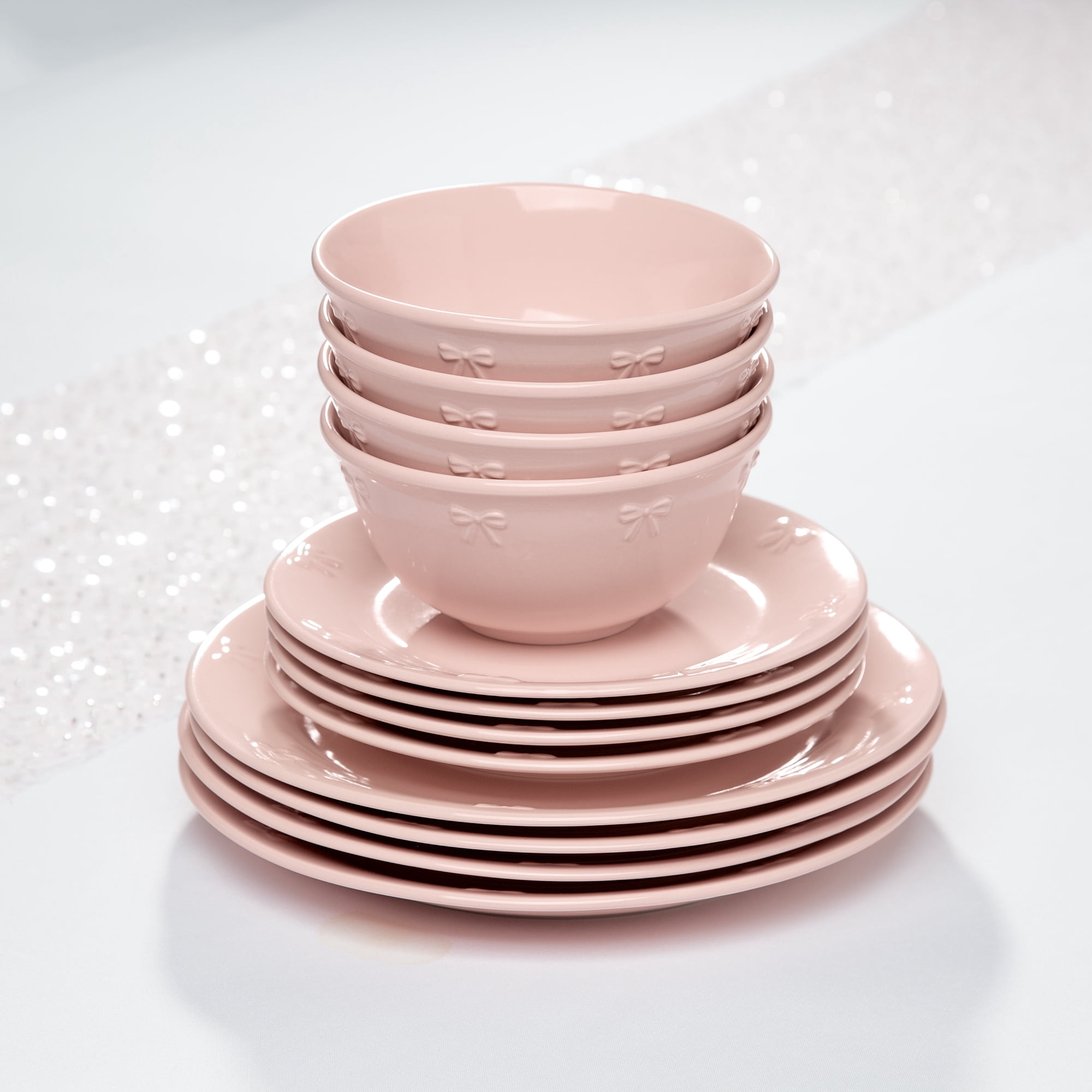 Paris Hilton London Collection 12-Piece Stoneware Dinnerware Set, Plates & Bowls Dish Set, Service for 4, Microwave & Dishwasher Safe, Blush Pink with Bow Design