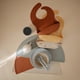 thumbnail image 2 of Babero de silicona para bebé Mushie ajustable e impermeable Clay, 2 of 9