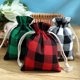 thumbnail image 1 of Bolsa de Regalo Navideña de Franela Estampada con Cordón Ajustable y Boca Ancha para Dulces Infantiles., 1 of 4