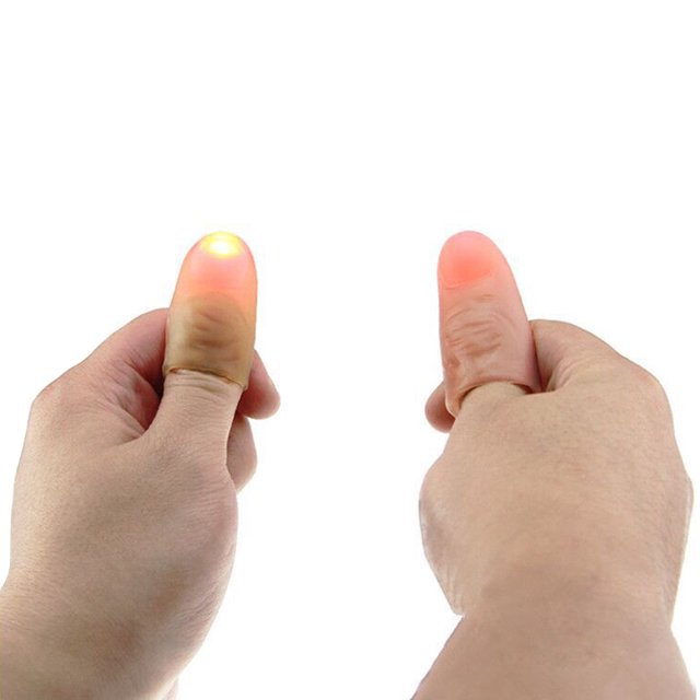 Trick Thumb Tip Light Thumb Tip Toy Super Bright Flashing Finger Lamp(Random Color)