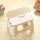 thumbnail image 2 of Taburete plegable de plástico beige compacto y duradero para niños y adultos, perfecto para aventuras al aire libre, 2 of 6