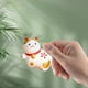 thumbnail image 3 of Figura de gato de la suerte de cerámica, adorno para salpicadero de coche, decoración interior de coche, tamaño pequeño Blanco 2, 3 of 7