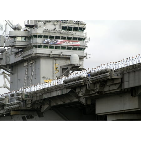 LAMINATED POSTER Sailors aboard USS Abraham Lincoln (CVN 72) man the rails as the ship pulls into NAS North Island to Poster Print 24 x