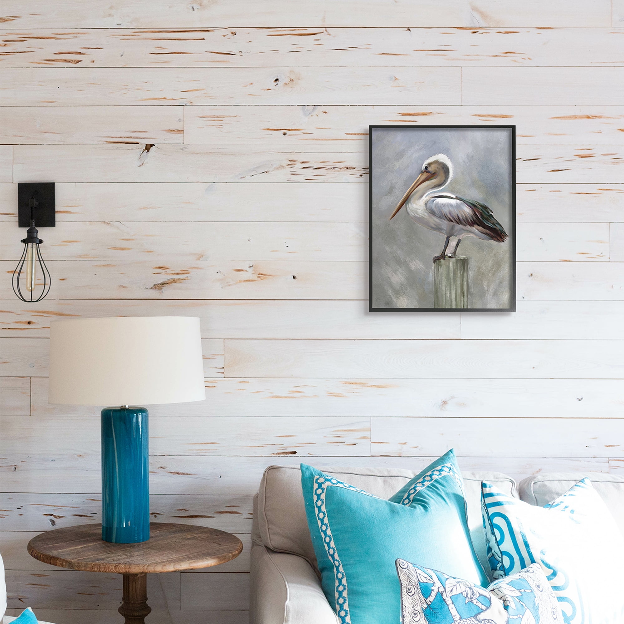 Pelican Resting on Wooden Pillar Soft Grey 16 in x 20 in Framed Painting Art Print, by Stupell Home Décor