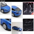 thumbnail image 2 of Coche Tesla modelo X90 fundido a escala 1:32 de metal con cierre retráctil, 2 of 5