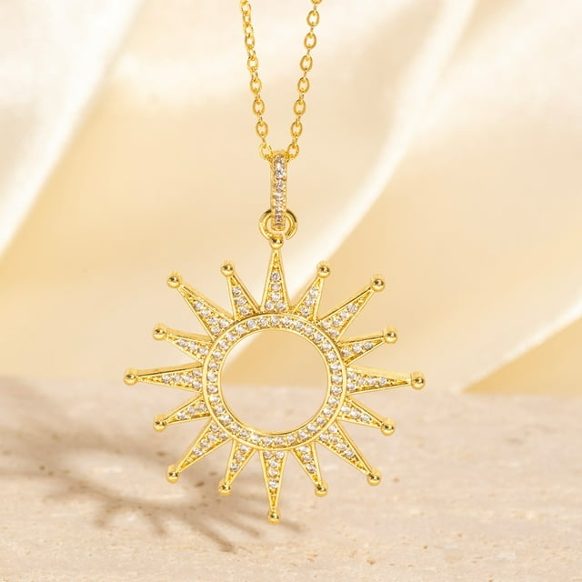 Colgante de zircon ligeramente incrustado en el sol collar dorado de cobre de alta gama de moda joyas de diseño de nicho creativo femenino