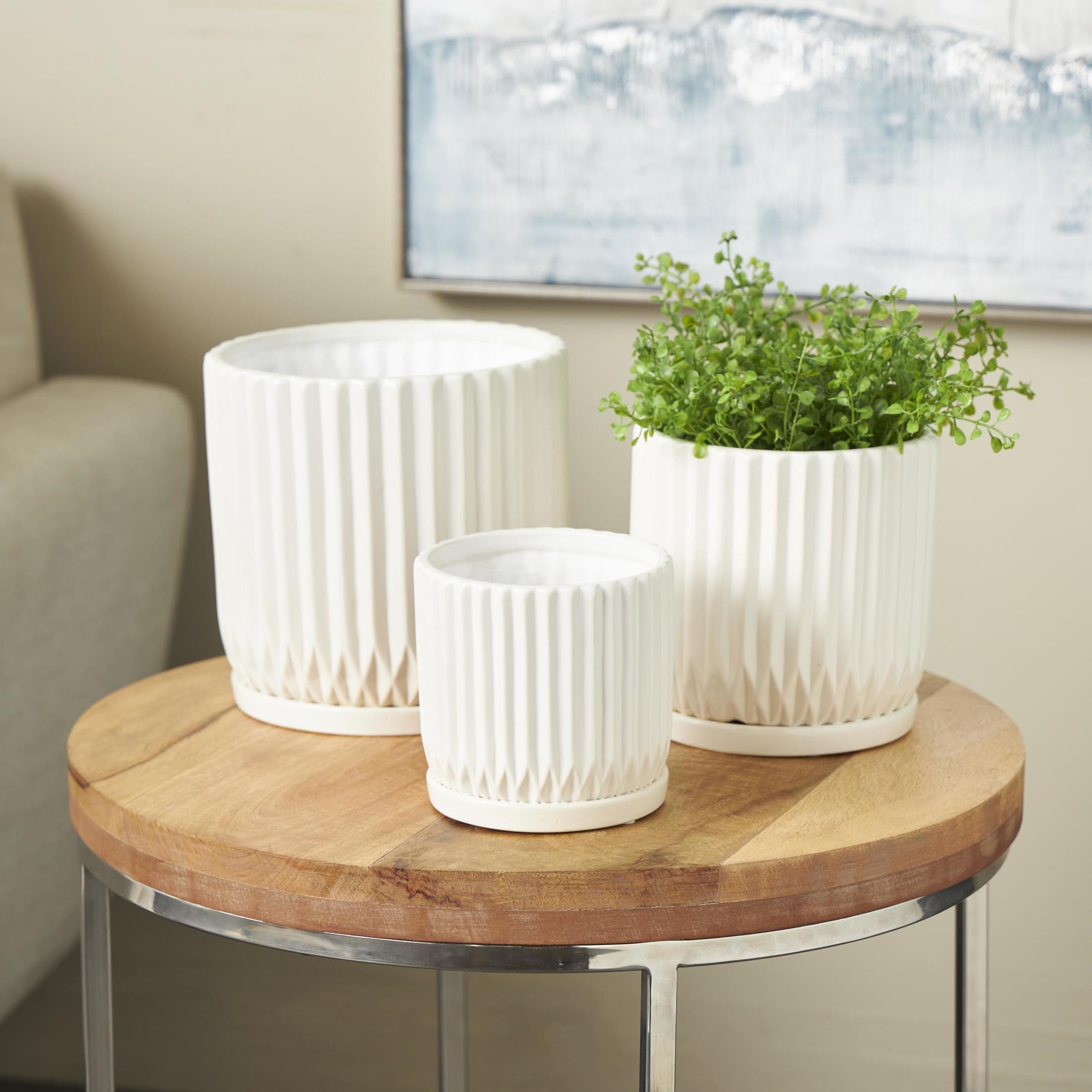 DecMode 8",7",5"H Ribbed White Ceramic Planter with Attached Saucer (3 Count)