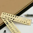 thumbnail image 3 of Regla recta hueca de Metal multifuncional, marcapáginas con patrón de letras y números, herramienta de medición de plantilla de dibujo de papelería Kawaii, 3 of 4