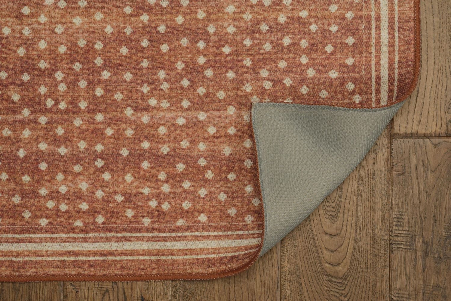 Tapis d'extérieur lavable Estero orange & ivoire 5 pi x7 pi