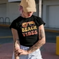thumbnail image 2 of Beach Vibes with Sunglasses, Ocean, Sea or Summer Themed, Groovy Retro Wavy Text Merch Gift, Black T-Shirt, Small, 2 of 5